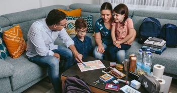 Family making emergency preparedness plans.